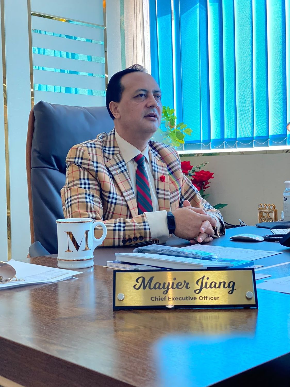 Mayier Jiang at his desk