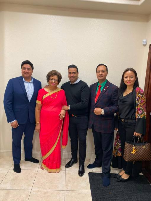 With guests at a formal reception